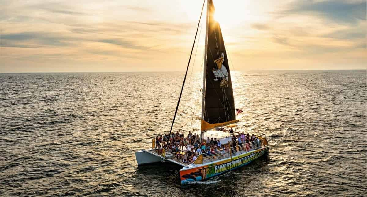 https://images.tripshock.com/activity/1053/Sunset-Dolphin-Sail-Aboard-The-Privateer-Catamaran.jpg