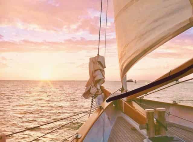 sun setting while aboard a key west sailing charter