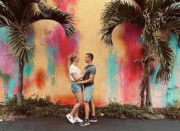 romantic photo in front of mural in old town key west