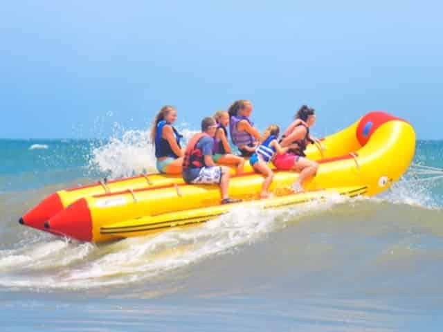 people on a banana boat ride