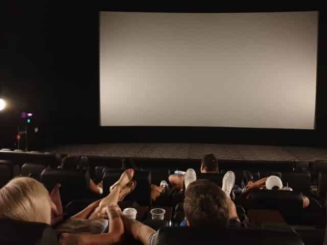 couple catching a movie in panama city beach