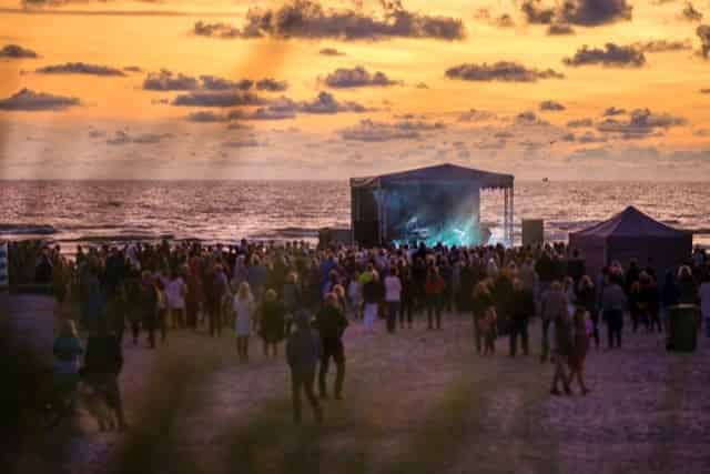 Concert at the beach during sunset