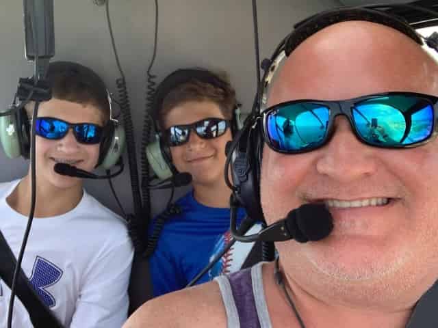 family on a helicopter charter