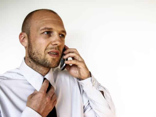 man calling insurance provider