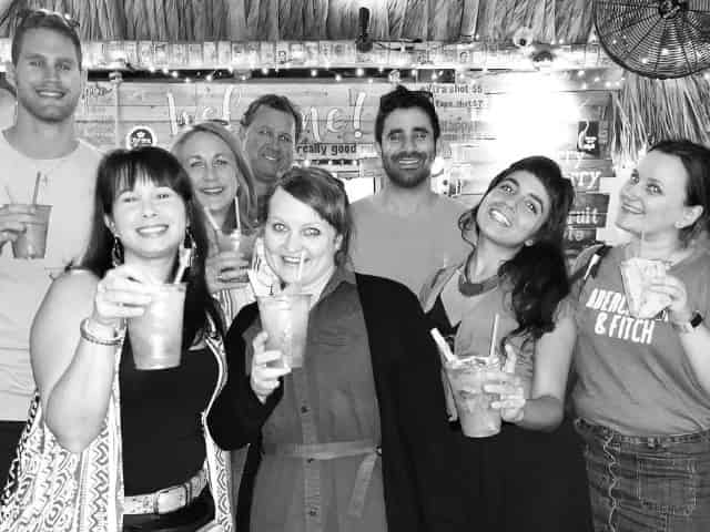 group enjoying a cocktail on a miami pub crawl