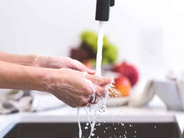 woman washing her hands