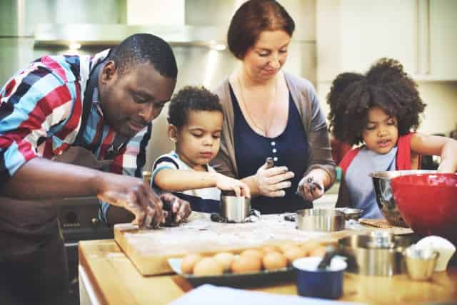 family cooking with kids during staycation