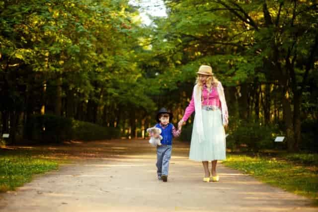 mother walking with child at the park