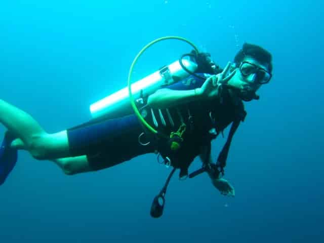 man scuba diving in key west