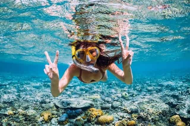 Woman snorkeling in Panama City Beach FL