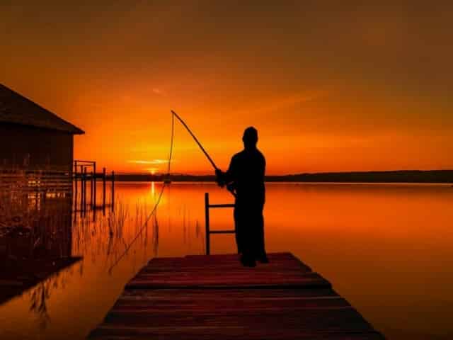 freshwater fishing at sunset