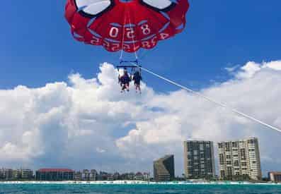 A Dip with the Dolphins Morning Parasailing in Miramar Beach