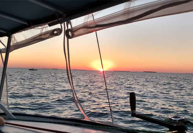 Sunset-Dolphin-Sail-Aboard-The-Footloose-Catamaran