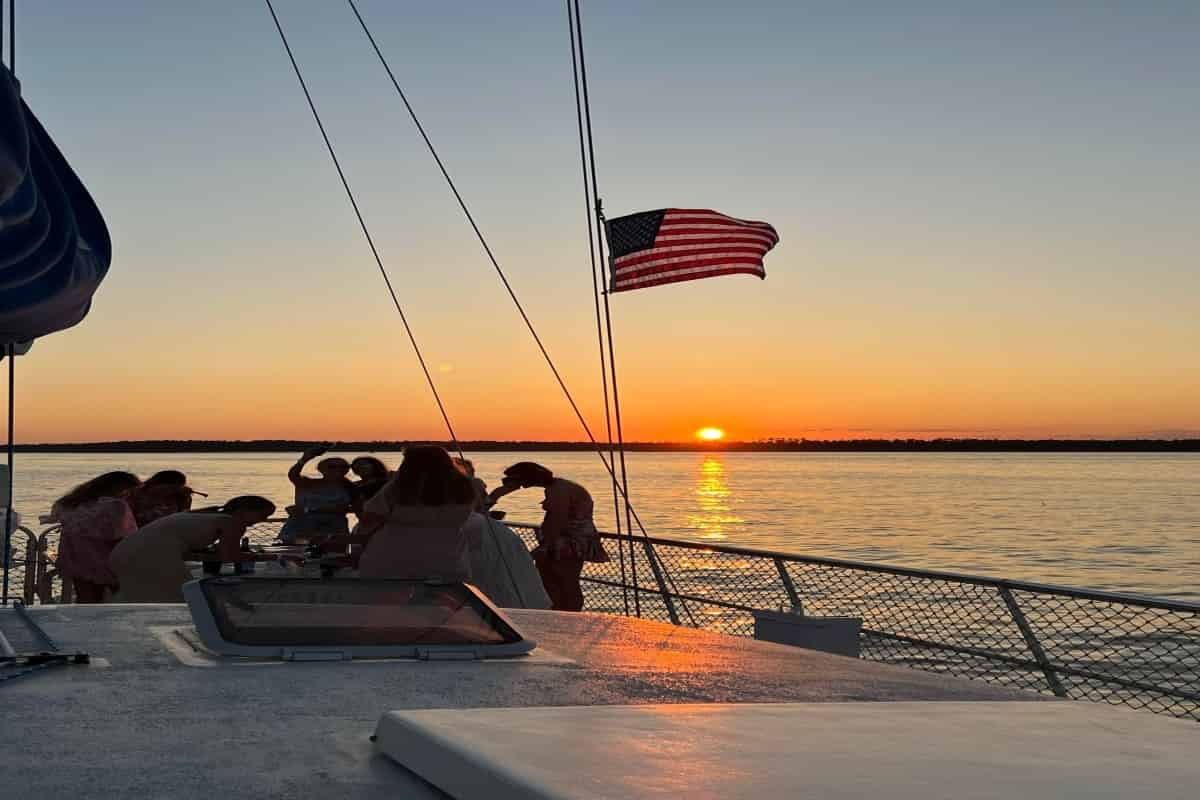 sunset sailboat cruise orange beach al