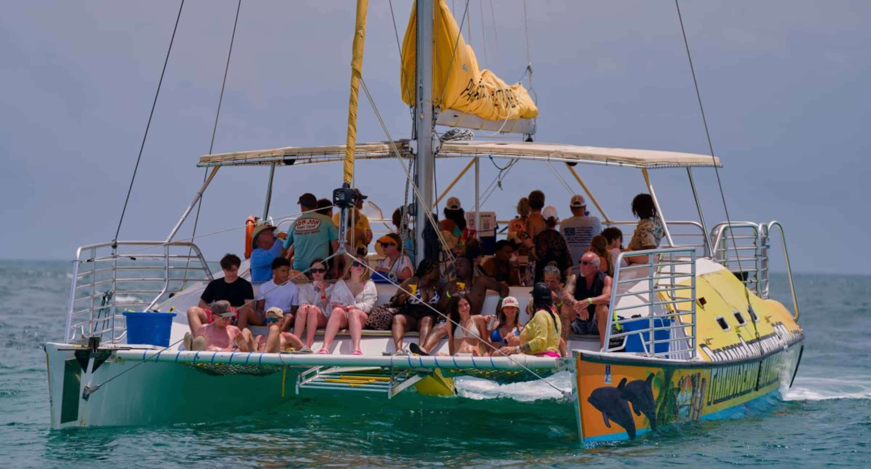 Sunset-Dolphin-Sail-Aboard-The-Footloose-Catamaran