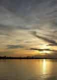Private Sunset Dolphin Cruise With Power Up Watersports