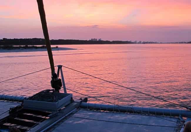 Sunset-Dolphin-Sail-Aboard-The-Privateer-Catamaran